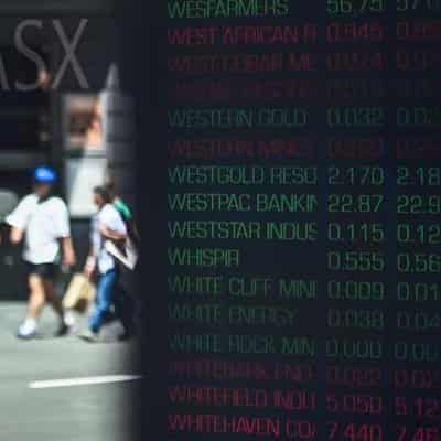 Australian shares edge lower as big banks weigh