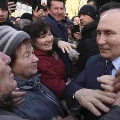 Putin master of all he surveys as Russians cast ballots