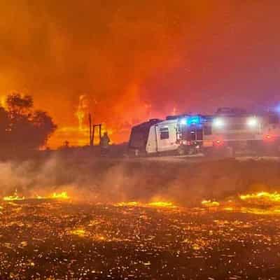 Homes razed after campers spark bushfire near Perth