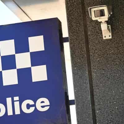 Man shot by police charged with multiple offences