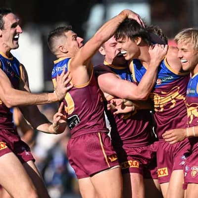 Lions show pride, maul Roos for first AFL win