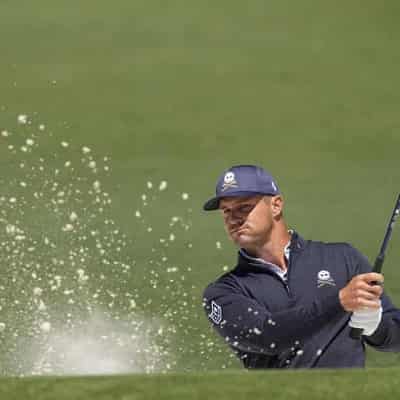 'Mad Scientist' DeChambeau shares Masters halfway lead