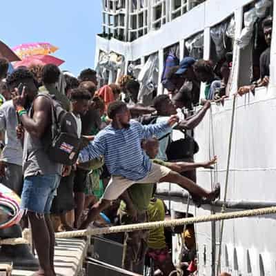 Voters defy warnings to board crowded Solomons ferries