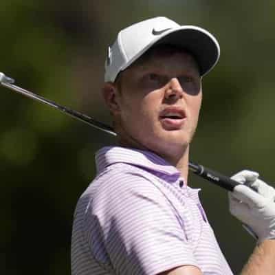 Davis rides roller-coaster to stay in Masters mix