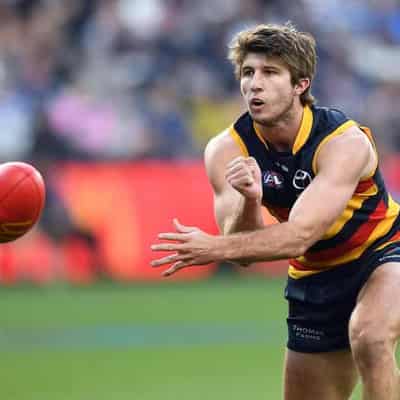 Adelaide lose key defender for clash against Essendon