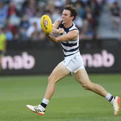 In-form Holmes stays at Cats with four-year deal