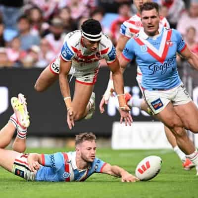 Walker leads Roosters' 60-18 thrashing of Dragons