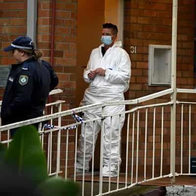 Two charged after woman’s body found in Bondi unit