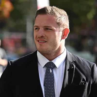 Woman cries as ex-NRL player cleared of groping claim