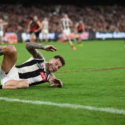 Back injury forces Magpie Elliott out of Eagles clash