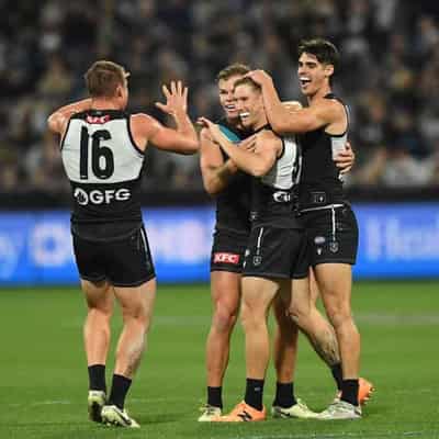 Power hold off Cats fightback in AFL thriller