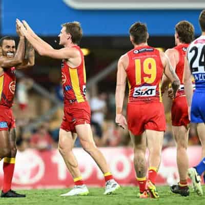 Suns clobber Kangaroos to ninth straight AFL loss