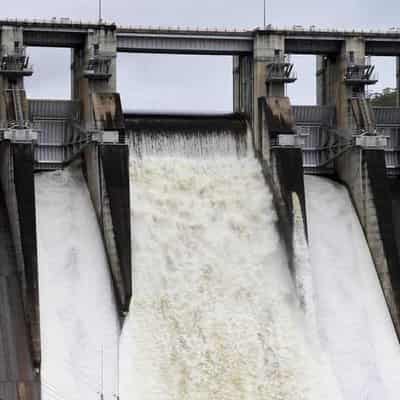 Sydney dam spilling as swathes of NSW cop more rain