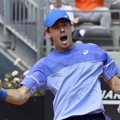 De Minaur into Rome's last 16 in rare top-20 clay win