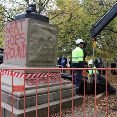 Colonial premier's statue toppled, spray-painted