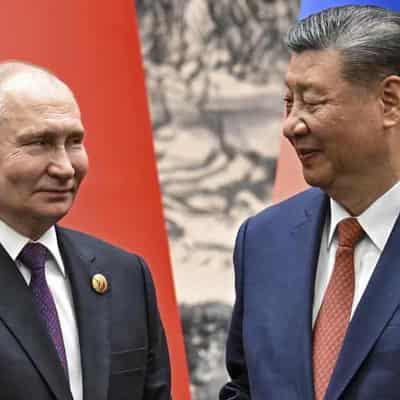 Xi and Putin condemn US, pledge closer ties