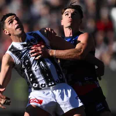 Great Scott, Magpies' marathon man leads by example