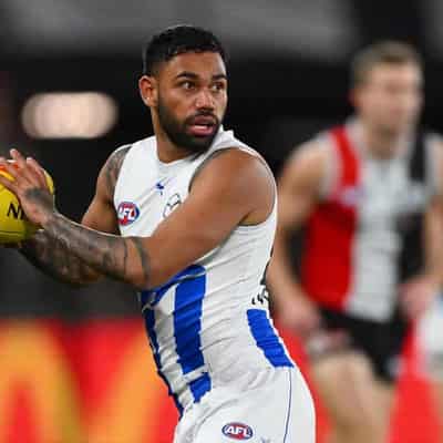 Ex-AFL player Tarryn Thomas charged over phone calls