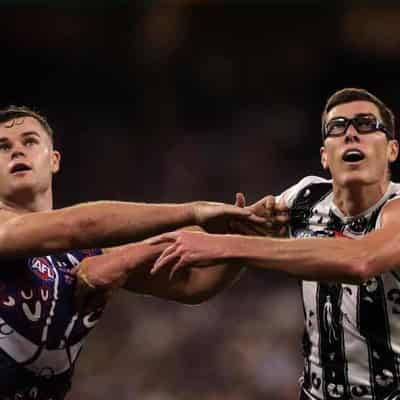 AFL ticks off free kick as Magpies fume after draw