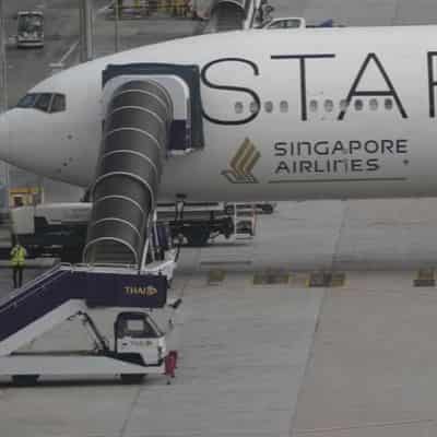 Aircraft hit by deadly turbulence returns to Singapore