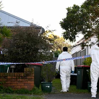 Woman charged with murder of man stabbed at home