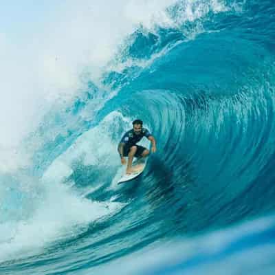 Ferreira reigns in monster Tahiti Pro swell