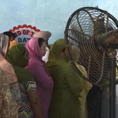 Indians vote in final phase of poll amid searing heat