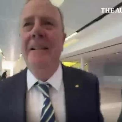 Peter Costello under fire over airport reporter clash