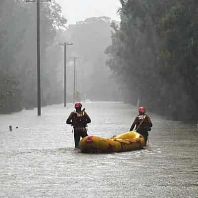 Rain eases and water recedes but flood risks remain