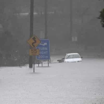 Returning river-town residents on alert as floods ease