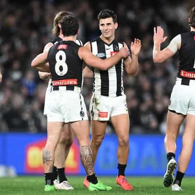 Pies pull off stunning AFL comeback to deny Kangaroos