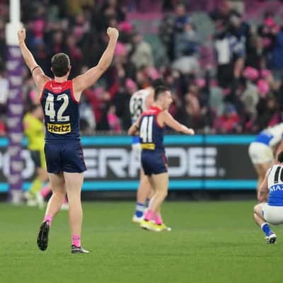 Roos' comeback falls short as Dees win fiery AFL clash
