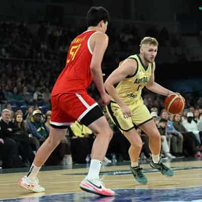 Tough Paris selection calls loom as Boomers beat China