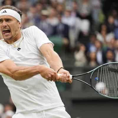 Zverev battles his way into Wimbledon's second week