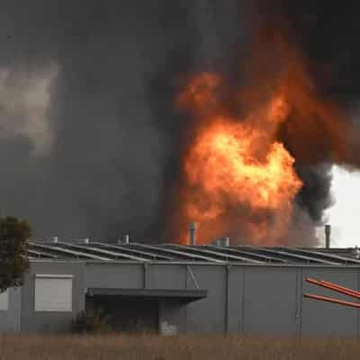 Toxic factory fireball contained but will rage for days