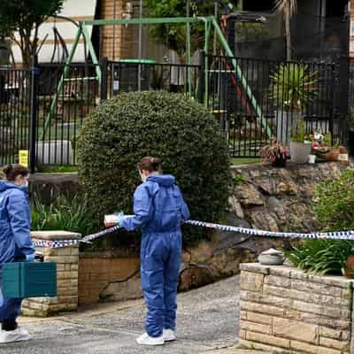 Woman and teen girl found dead in suburban home