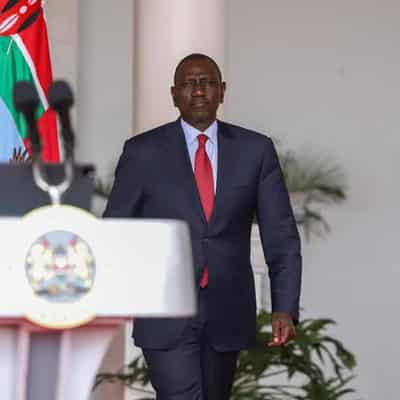 Kenya president sacks cabinet, bows to protest pressure