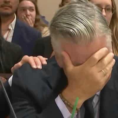 Baldwin breaks down as manslaughter case thrown out