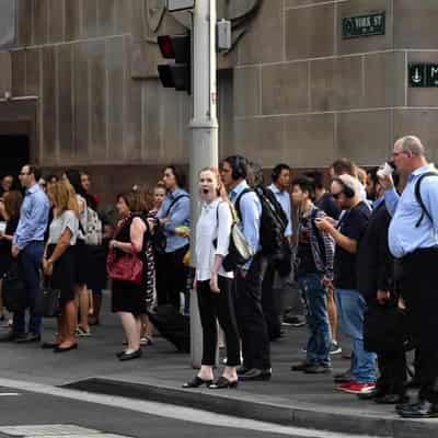 Workers trudge into offices but mandates may not help