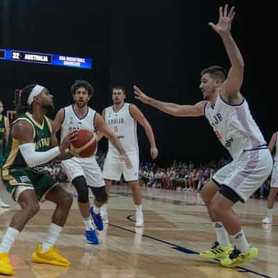 Mills finds form to help Boomers down Jokic and Serbia