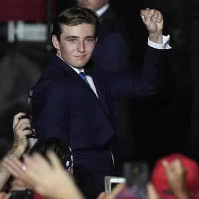 Old picture of Trump's teenage son used in latest shooting claim