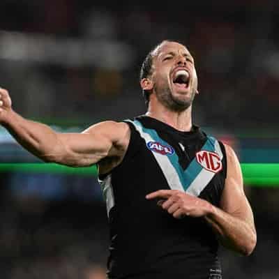 Port Adelaide down plucky Richmond, rise into top eight