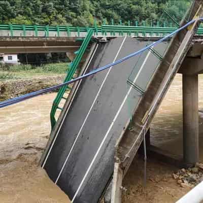 Floods kill at least eight, 30 missing in China