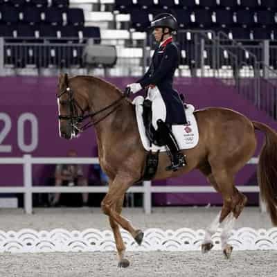 Champion British rider Dujardin whipped horse's legs