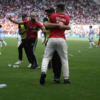 Morocco fans' pitch invasion halts match with Argentina