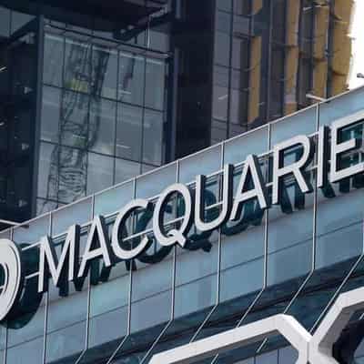 Macquarie reports subdued earnings, shares slide