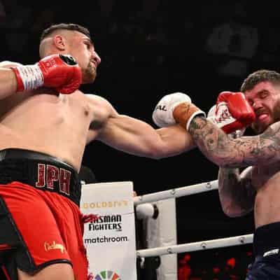 Huni retains WBO Global heavyweight title by knockout