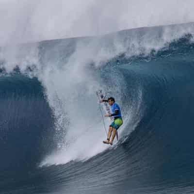 Robinson beats world No.1 Florence in Olympic surfing