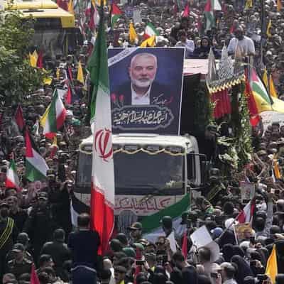 Iran’s supreme leader prays over the coffin of Haniyeh