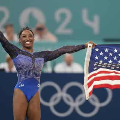 Biles edges Andrade for Olympic all-around title